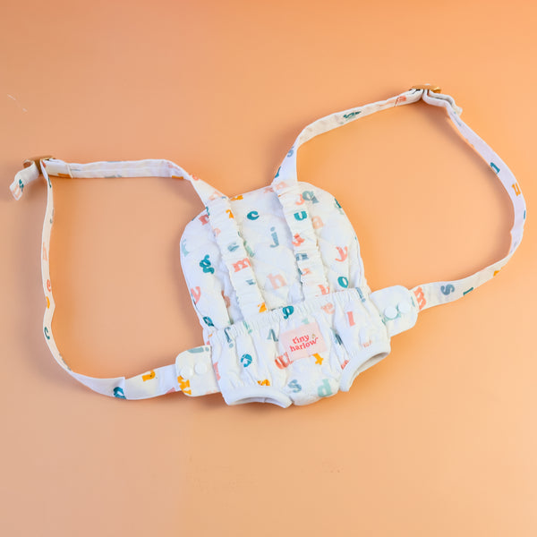 Tiny Harlow Baby Carrier - Alphabet Soup